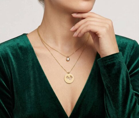 Gouden baby voet en hand hanger