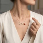 Gouden zirkonia Infinity lieveheersbeestje hanger
