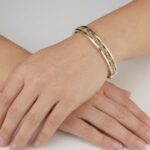 Bicolor gouden slavenarmband