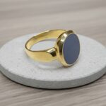 Christian goud cachet ring met lagensteen
