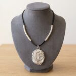 Christian zilveren hanger met leer