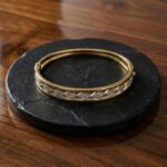 Bicolor gouden slavenarmband