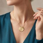 Geel gouden ketting met ronde hanger