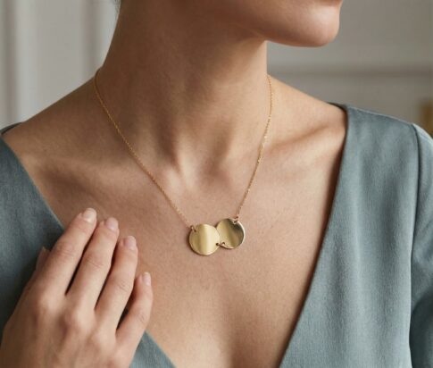 Gouden ketting met dubbele ronde hanger