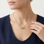 Gouden ketting en infinity hanger