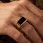 Geel gouden zegelring met onyx