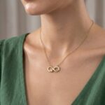 Gouden ketting en infinity zirkonia hanger