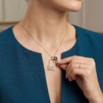 Gouden zirkonia sleutel met slot hanger