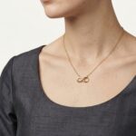 Gouden ketting en infinity hanger