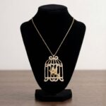 Gouden zirkonia vogelkooi hanger