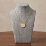 Gouden ketting met ronde hanger