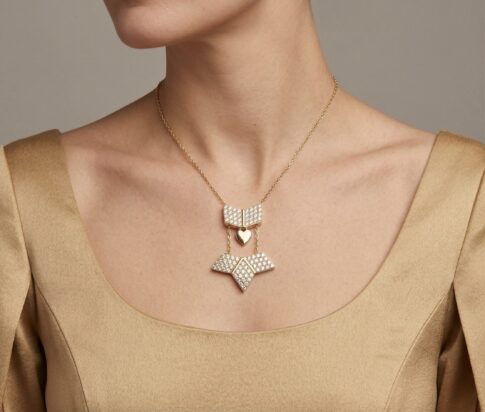 Gouden ster hanger met uitschuifbare hart