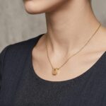 Gouden ketting met U hanger