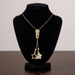 Gouden vlinder en ster hanger