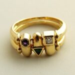 18 karaat gouden ring met diamant, smaragd en saffier