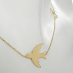 Gouden vogel bedelketting