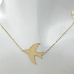 Gouden vogel bedelketting
