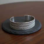 Zilveren klemarmband geweven en torsdraad