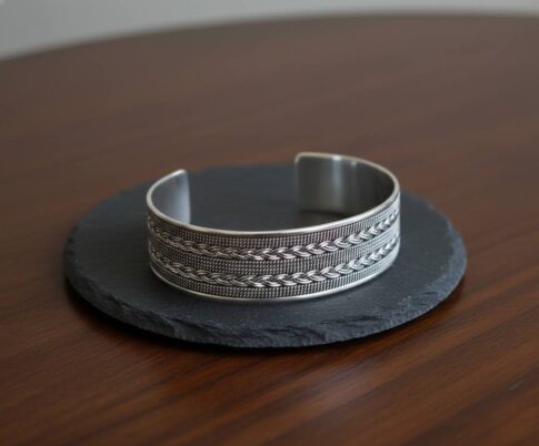 Zilveren klemarmband geweven en torsdraad