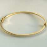 Geel gouden 14 karaat slavenarmband