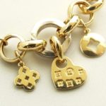 14 karaat gouden bedeltjes armband