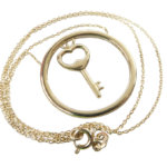 Gouden cirkel met sleutel hanger