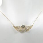 Gouden hart met zirkonia vleugels hanger