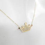 Gouden zirkonia kroon hanger