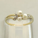 Geel gouden ring met parel en diamant