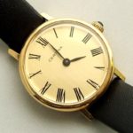 Gouden Certina horloge