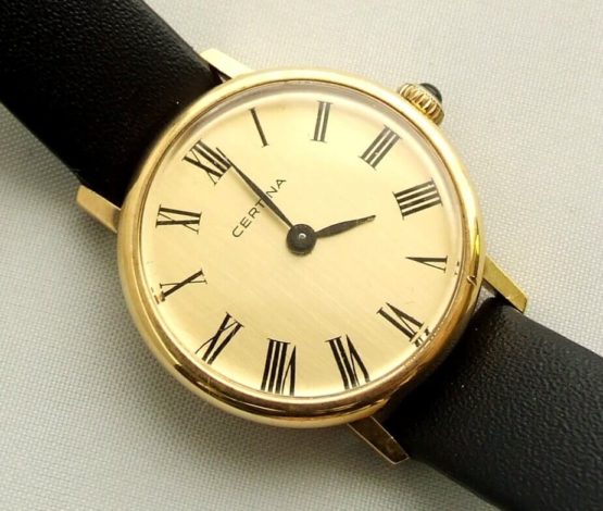 Gouden Certina horloge