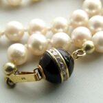 Parelcollier met gouden slot