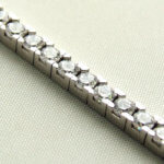Wit gouden tennisarmband met zirkonia
