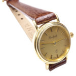 Gouden Bouchard horloge met leren band
