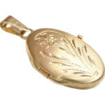 Gouden medaillon met bloem motief