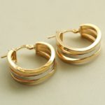 Christian 14 karaat bicolor gouden oorbellen