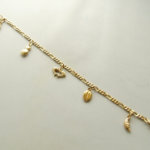 Geel gouden enkelband met bedeltjes