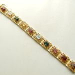 Gouden armband met edelstenen