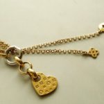Gouden collier met hangers