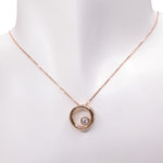 14 karaat rosé gouden ketting cirkel met centrale steen