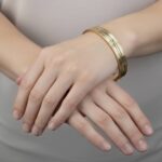 Christian gouden slavenarmband tricolor