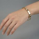 Geel gouden Christian 14 karaat slavenarmband