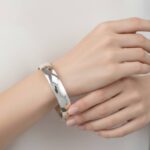 Christian 14 karaat slavenarmband