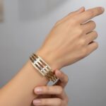 Gouden tricolor slavenarmband met zirkonia