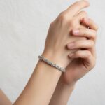 Christian wit gouden armband met diamanten