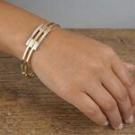 Wit en geel gouden Christian scharnier armband