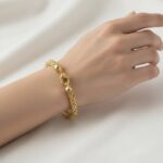 Geel gouden Christian schakelarmband