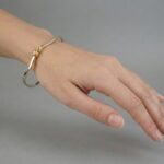 14 karaat gouden bicolor slavenarmband Christian