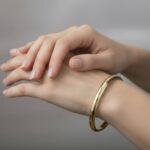 Goud op zilver slavenarmband