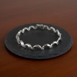 Christian wit goud armband